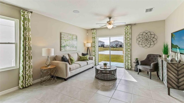 2593 Birney Run, Zephyrhills, FL 33541 - living room featuring a ceiling fan and light tile patterned floors