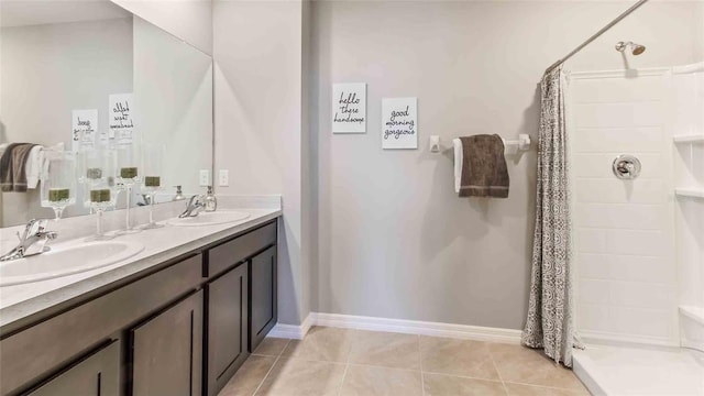 2593 Birney Run, Zephyrhills, FL 33541 - full bathroom featuring double vanity, a tile shower, and tile patterned flooring