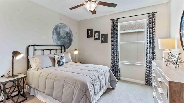 2621 Birney Run, Zephyrhills, FL 33541 - carpeted bedroom with baseboards and a ceiling fan