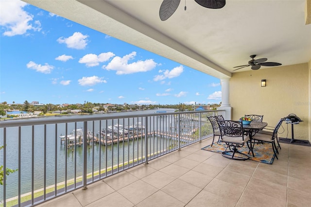 3805 Gulf Blvd Unit 401, St Pete Beach, FL 33706 - balcony with ceiling fan and a water view