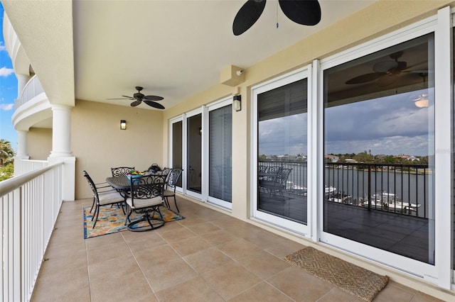 3805 Gulf Blvd Unit 401, St Pete Beach, FL 33706 - balcony featuring a ceiling fan