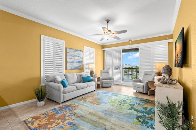 3805 Gulf Blvd Unit 401, St Pete Beach, FL 33706 - tiled living area featuring ornamental molding and a ceiling fan