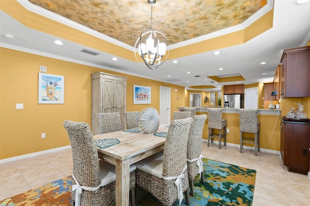 3805 Gulf Blvd Unit 401, St Pete Beach, FL 33706 - dining room featuring a raised ceiling, crown molding, light tile patterned flooring, a chandelier, and recessed lighting