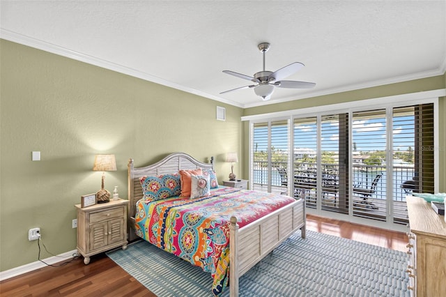 3805 Gulf Blvd Unit 401, St Pete Beach, FL 33706 - bedroom featuring access to outside, wood finished floors, crown molding, a water view, and ceiling fan