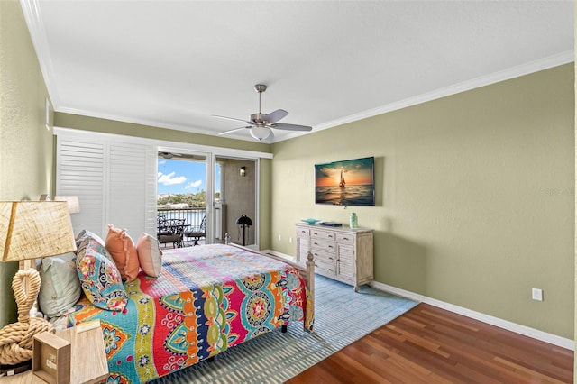 3805 Gulf Blvd Unit 401, St Pete Beach, FL 33706 - bedroom with access to exterior, wood finished floors, ornamental molding, and a ceiling fan