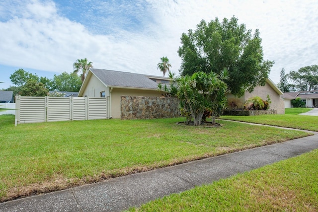 2421 Eagle Chase Dr, Palm Harbor, FL 34683 - view of front facade featuring stucco siding