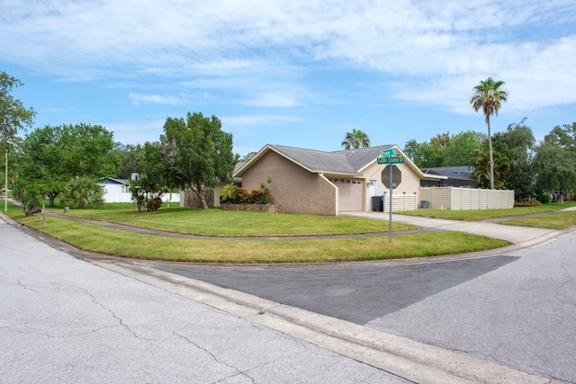 2421 Eagle Chase Dr, Palm Harbor, FL 34683 - view of front of house with driveway, a garage, and stucco siding