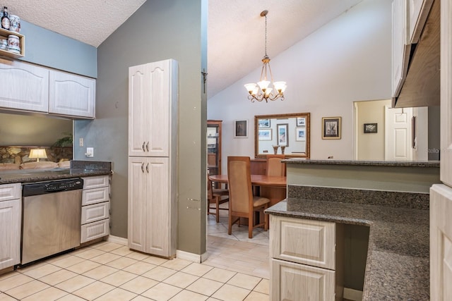 2421 Eagle Chase Dr, Palm Harbor, FL 34683 - kitchen with stainless steel dishwasher, a chandelier, light tile patterned floors, a textured ceiling, and decorative light fixtures