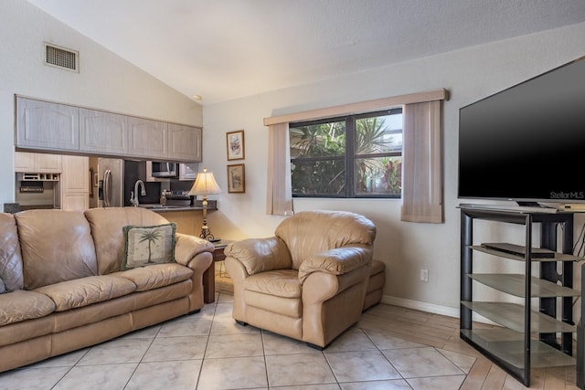 2421 Eagle Chase Dr, Palm Harbor, FL 34683 - living room with vaulted ceiling and baseboards