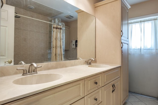 2421 Eagle Chase Dr, Palm Harbor, FL 34683 - full bath featuring double vanity, tile patterned flooring, and a shower with curtain