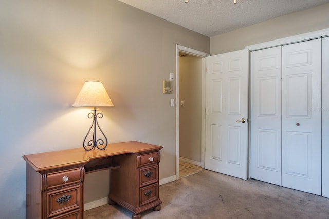 2421 Eagle Chase Dr, Palm Harbor, FL 34683 - home office featuring light carpet and a textured ceiling