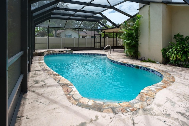 2421 Eagle Chase Dr, Palm Harbor, FL 34683 - outdoor pool with a patio and glass enclosure