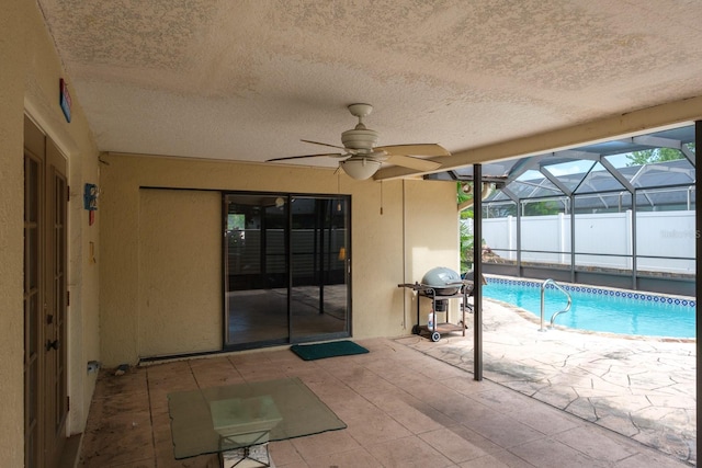 2421 Eagle Chase Dr, Palm Harbor, FL 34683 - view of pool with area for grilling, a patio, ceiling fan, and glass enclosure