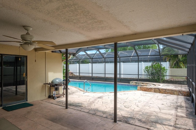 2421 Eagle Chase Dr, Palm Harbor, FL 34683 - view of swimming pool with a patio, a grill, a ceiling fan, and a lanai