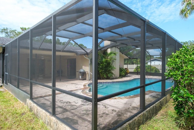 2421 Eagle Chase Dr, Palm Harbor, FL 34683 - view of pool featuring a grill, a patio area, ceiling fan, and glass enclosure