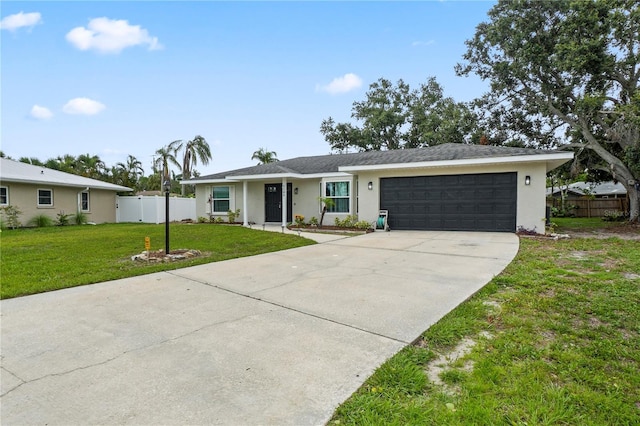 7108 14th Ave NW, Bradenton, FL 34209 - ranch-style house featuring driveway, an attached garage, and stucco siding