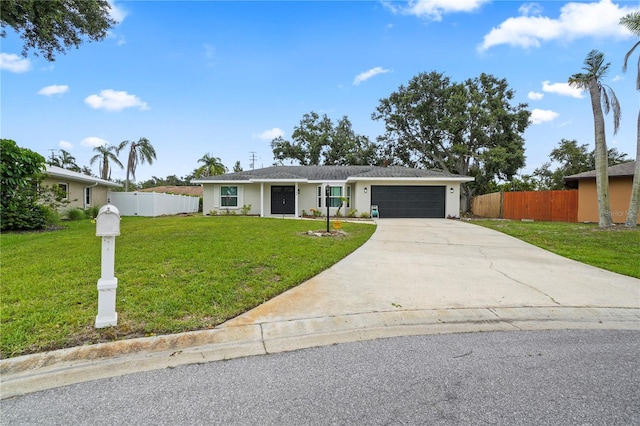 7108 14th Ave NW, Bradenton, FL 34209 - ranch-style home featuring an attached garage, concrete driveway, and stucco siding