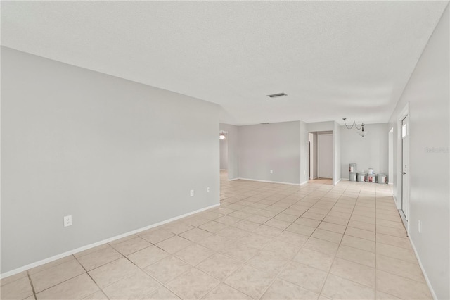 7108 14th Ave NW, Bradenton, FL 34209 - empty room featuring baseboards and light tile patterned floors