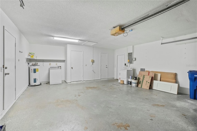 7108 14th Ave NW, Bradenton, FL 34209 - garage with water heater, a garage door opener, electric panel, and washing machine and clothes dryer