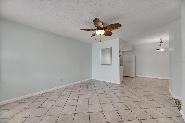 1049 Apollo Beach Blvd Unit D, Apollo Beach, FL 33572 - spare room featuring ceiling fan and a textured ceiling