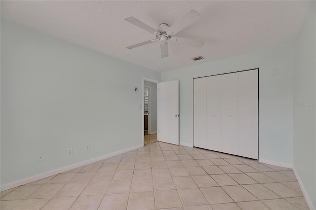 1049 Apollo Beach Blvd Unit D, Apollo Beach, FL 33572 - unfurnished bedroom featuring a ceiling fan and a closet