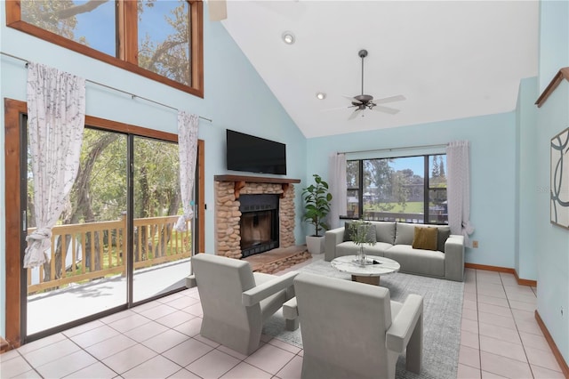 9501 Alice Ln, Riverview, FL 33578 - living area with high vaulted ceiling, a ceiling fan, light tile patterned flooring, a stone fireplace, and recessed lighting