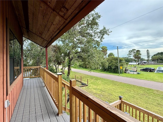 9501 Alice Ln, Riverview, FL 33578 - wooden deck featuring a yard