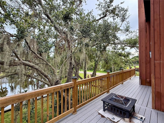 9501 Alice Ln, Riverview, FL 33578 - deck featuring a fire pit