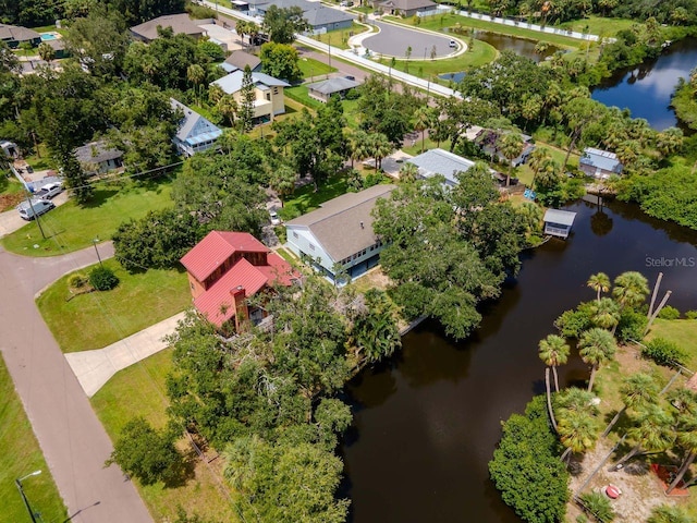 9501 Alice Ln, Riverview, FL 33578 - aerial view of residential area featuring a nearby body of water and a tree filled landscape