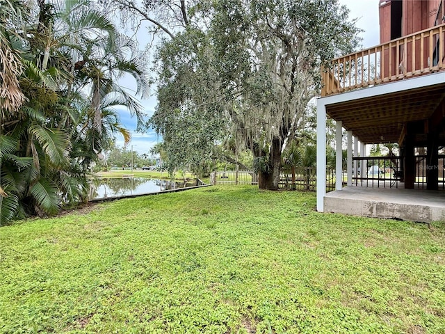 9501 Alice Ln, Riverview, FL 33578 - view of yard with a deck with water view