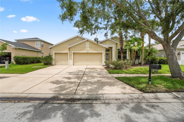 11810 Holly Creek Dr, Riverview, FL 33569 - ranch-style house with stucco siding, a front lawn, concrete driveway, and an attached garage