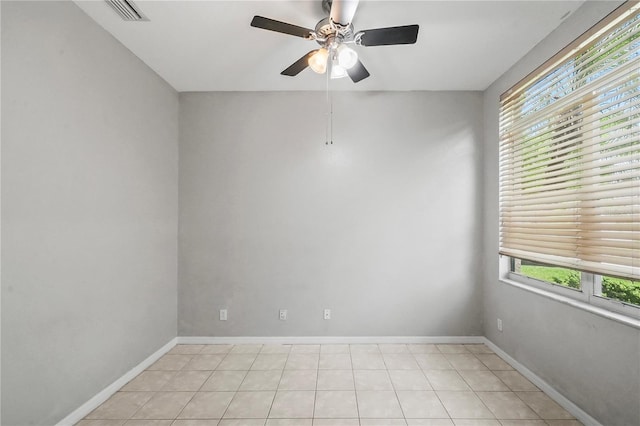 11810 Holly Creek Dr, Riverview, FL 33569 - empty room featuring plenty of natural light, ceiling fan, and light tile patterned flooring