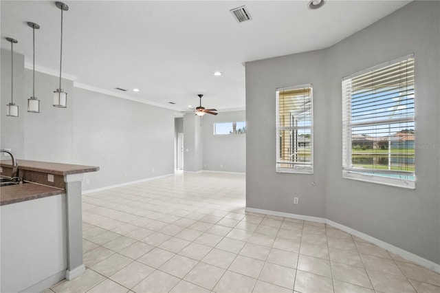 11810 Holly Creek Dr, Riverview, FL 33569 - unfurnished living room featuring ceiling fan, light tile patterned floors, recessed lighting, and ornamental molding