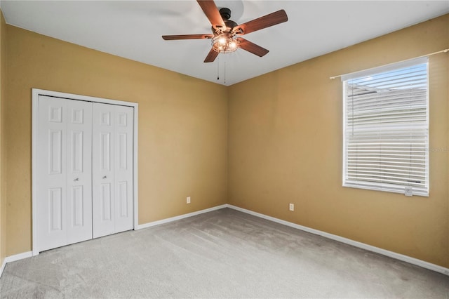 11810 Holly Creek Dr, Riverview, FL 33569 - unfurnished bedroom with carpet, a closet, and a ceiling fan