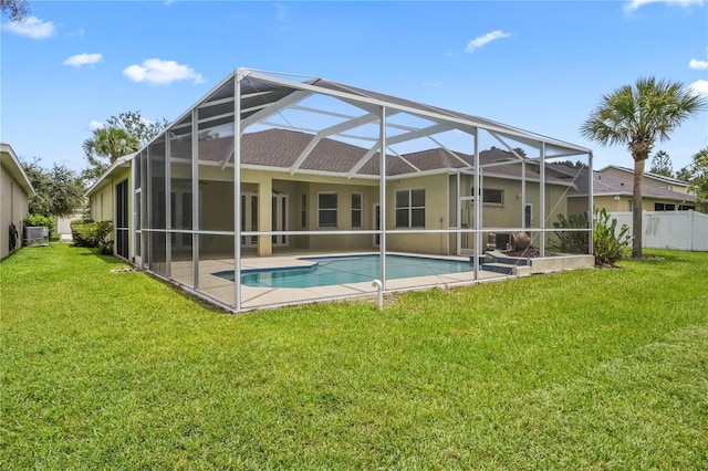 11810 Holly Creek Dr, Riverview, FL 33569 - back of house with an outdoor pool, a patio area, stucco siding, and glass enclosure