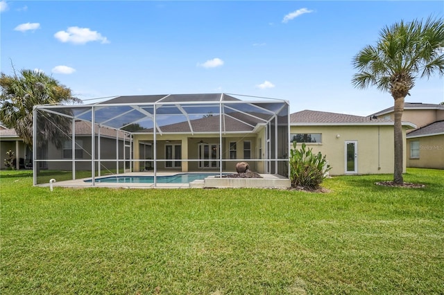 11810 Holly Creek Dr, Riverview, FL 33569 - rear view of house featuring a yard, stucco siding, an outdoor pool, and a lanai