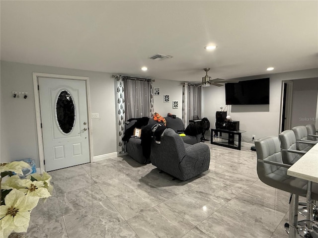 2927 W Henry Ave, Tampa, FL 33614 - living area featuring recessed lighting, light marble finish floors, and a ceiling fan