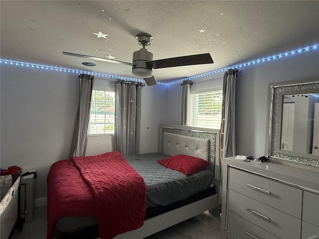 2927 W Henry Ave, Tampa, FL 33614 - bedroom featuring a textured ceiling and ceiling fan