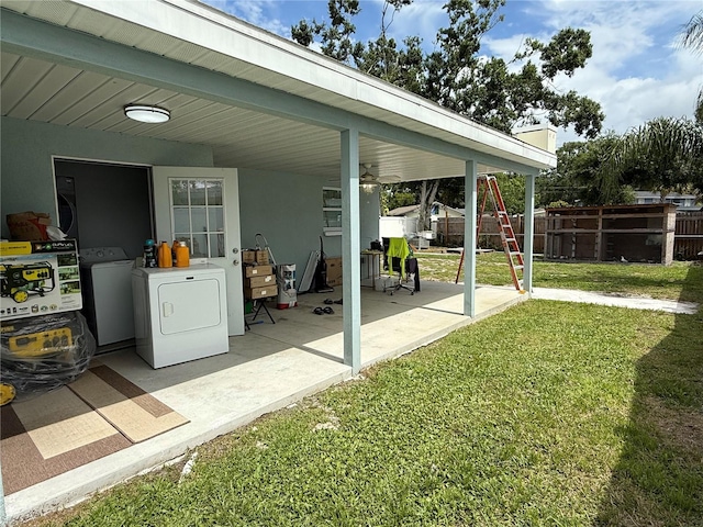 2927 W Henry Ave, Tampa, FL 33614 - view of patio / terrace featuring independent washer and dryer