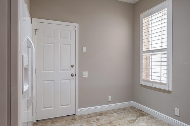 3298 Covered Bridge Dr W, Dunedin, FL 34698 - entrance foyer with baseboards