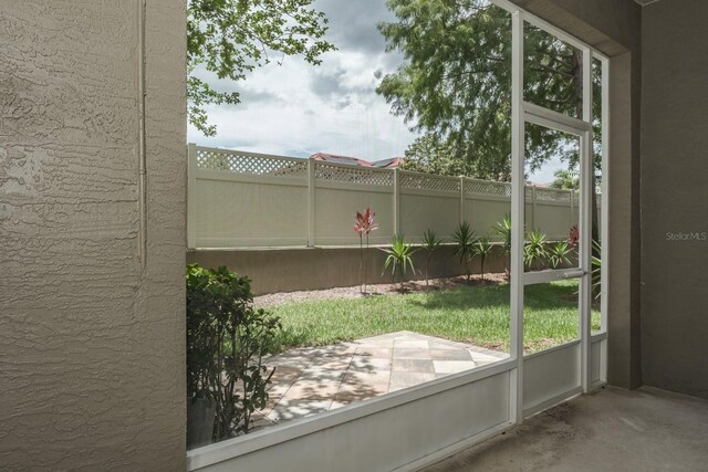 3298 Covered Bridge Dr W, Dunedin, FL 34698 - view of unfurnished sunroom