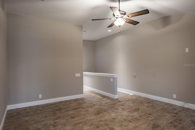 3298 Covered Bridge Dr W, Dunedin, FL 34698 - empty room with wood finished floors, ceiling fan, and recessed lighting