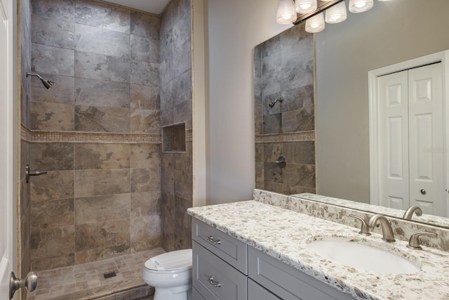 3298 Covered Bridge Dr W, Dunedin, FL 34698 - bathroom featuring vanity and a tile shower