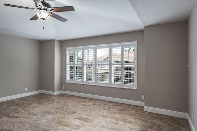 3298 Covered Bridge Dr W, Dunedin, FL 34698 - unfurnished room with a ceiling fan and light wood-type flooring