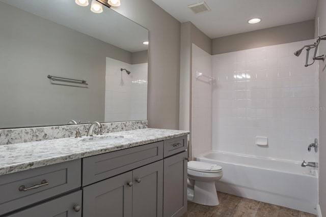 3298 Covered Bridge Dr W, Dunedin, FL 34698 - full bathroom featuring vanity, shower / tub combination, and wood finished floors
