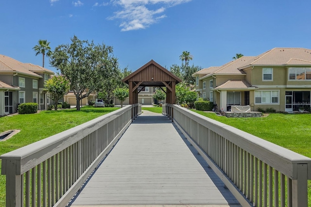 3298 Covered Bridge Dr W, Dunedin, FL 34698 - view of community featuring a gazebo, a lawn, and a residential view