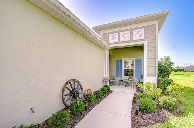 13621 Circa Crossing Dr, Lithia, FL 33547 - entrance to property with stucco siding