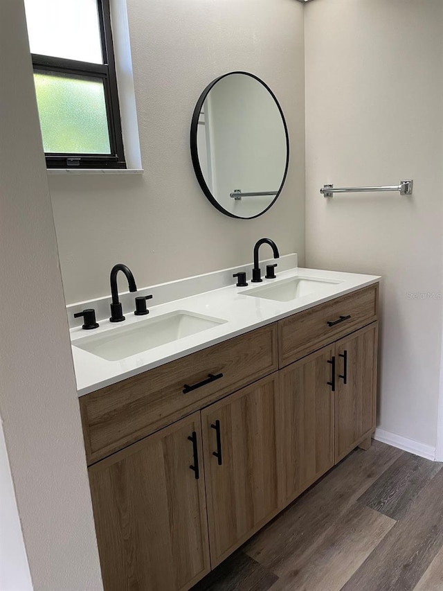 3610 54th St W Unit B8, Bradenton, FL 34209 - bathroom with double vanity and wood finished floors