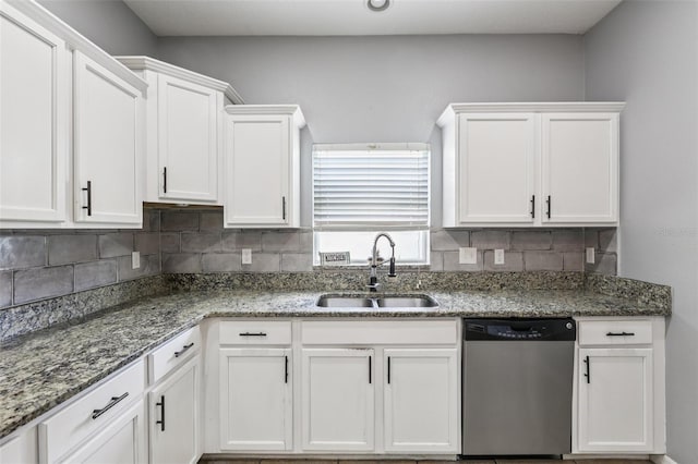1811 Palm Warbler Ln, Ruskin, FL 33570 - kitchen with dishwasher, white cabinetry, decorative backsplash, and stone countertops