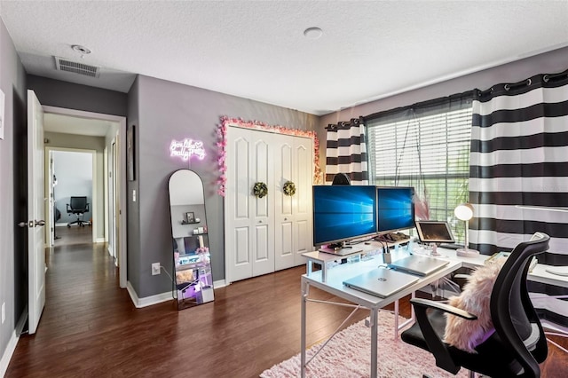 1811 Palm Warbler Ln, Ruskin, FL 33570 - office featuring wood finished floors and a textured ceiling